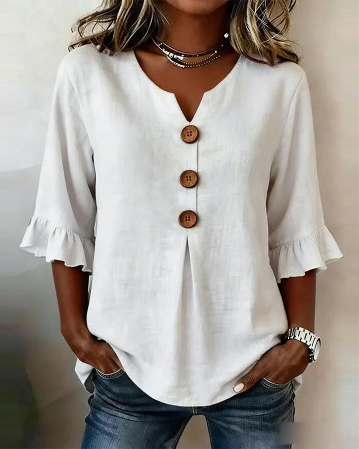 Sophia Blouse unicolor katoen-linnen met houten knopen en volant