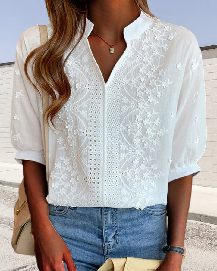 Blouse met V-hals en pofmouwen met kantdecoratie
