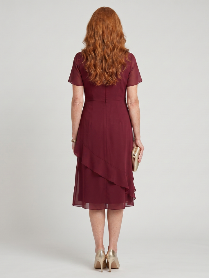 Eira™ | Elegante Midi Jurk met Gelaagde Zoom & Transparante Mouwen