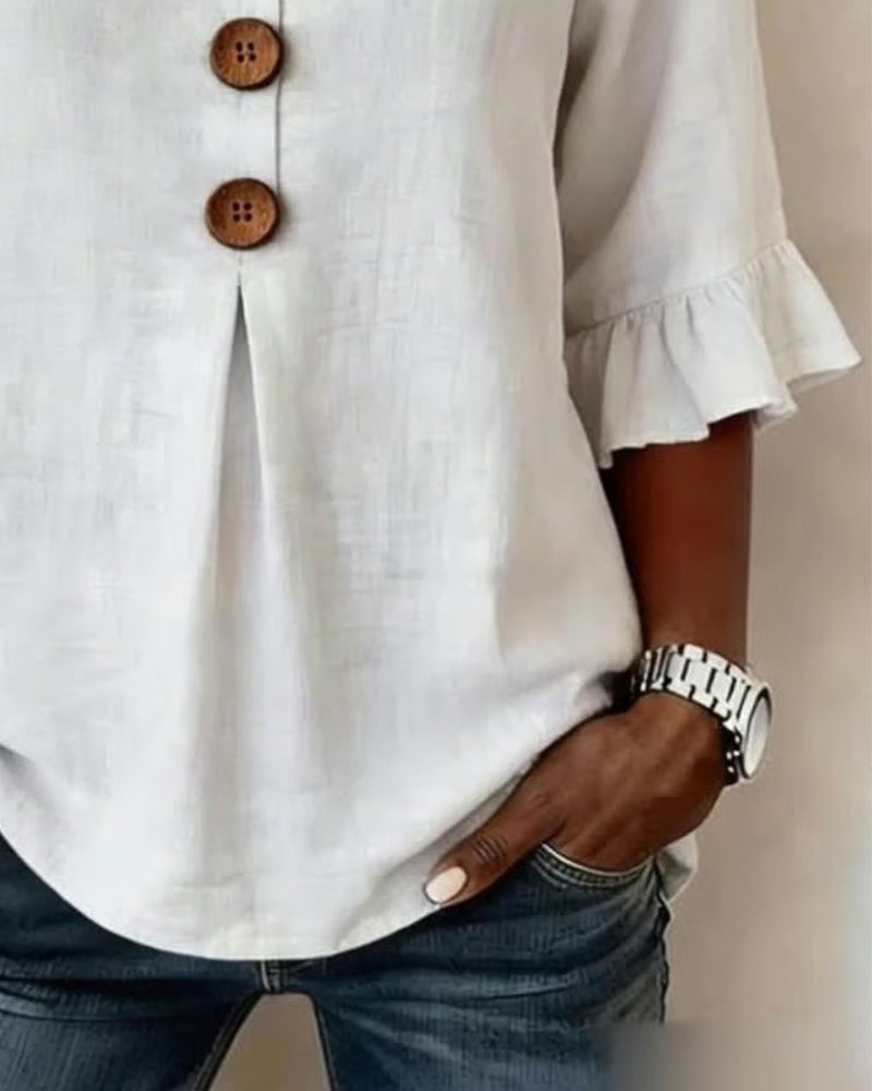 Sophia Blouse unicolor katoen-linnen met houten knopen en volant