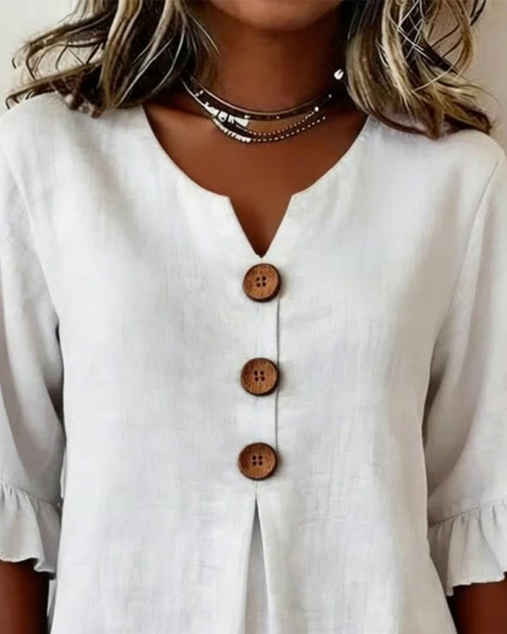 Sophia Blouse unicolor katoen-linnen met houten knopen en volant