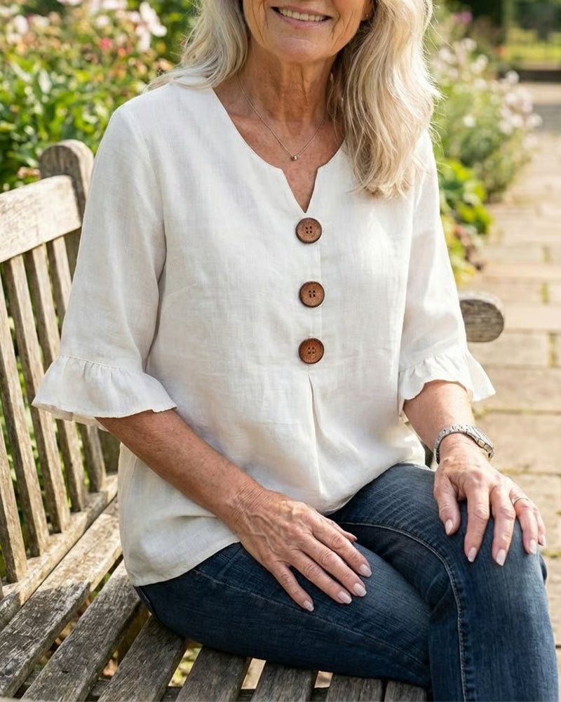 Sophia Blouse unicolor katoen-linnen met houten knopen en volant