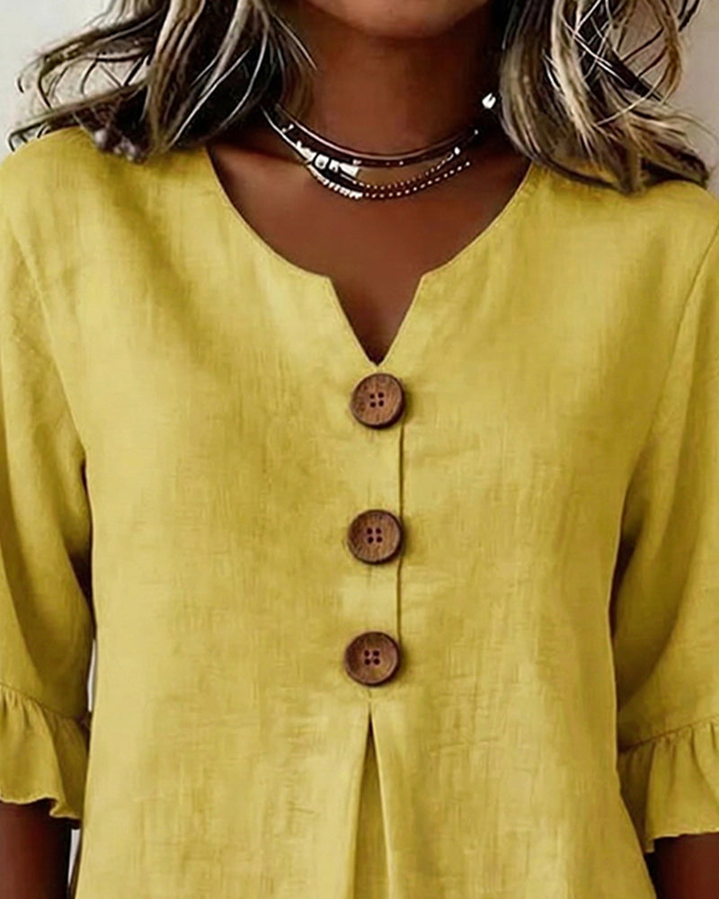 Sophia Blouse unicolor katoen-linnen met houten knopen en volant