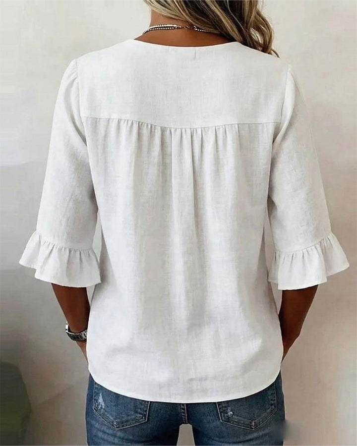 Sophia Blouse unicolor katoen-linnen met houten knopen en volant