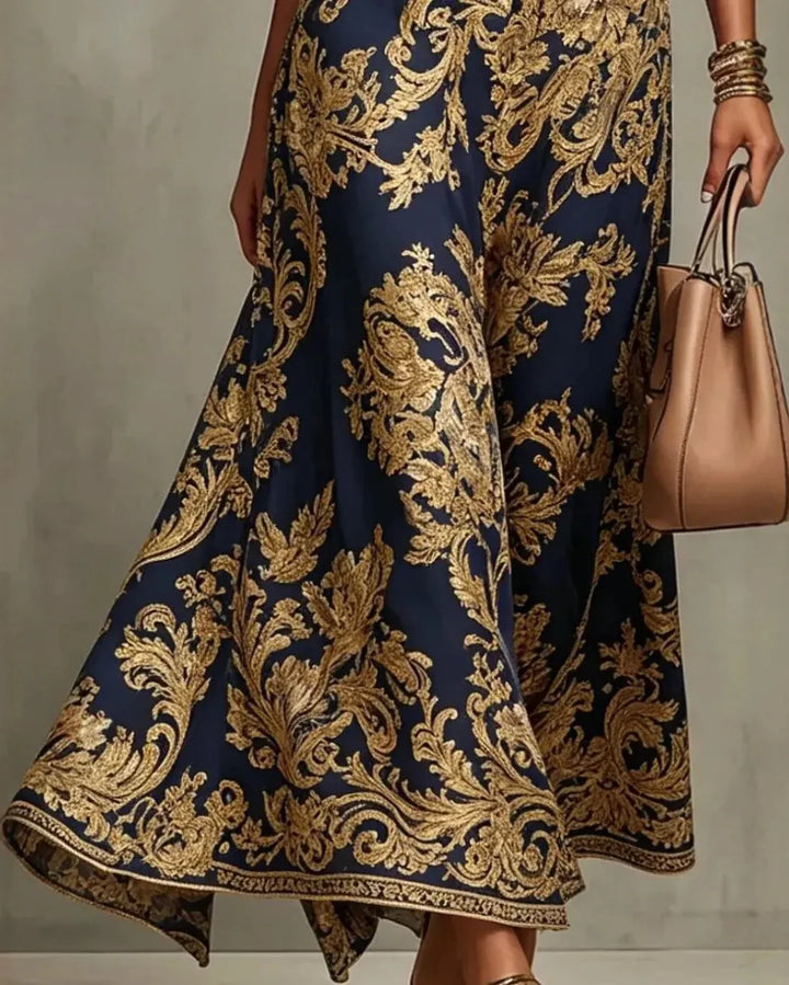 Cornelia | Glamour jurk met gouden barokprint