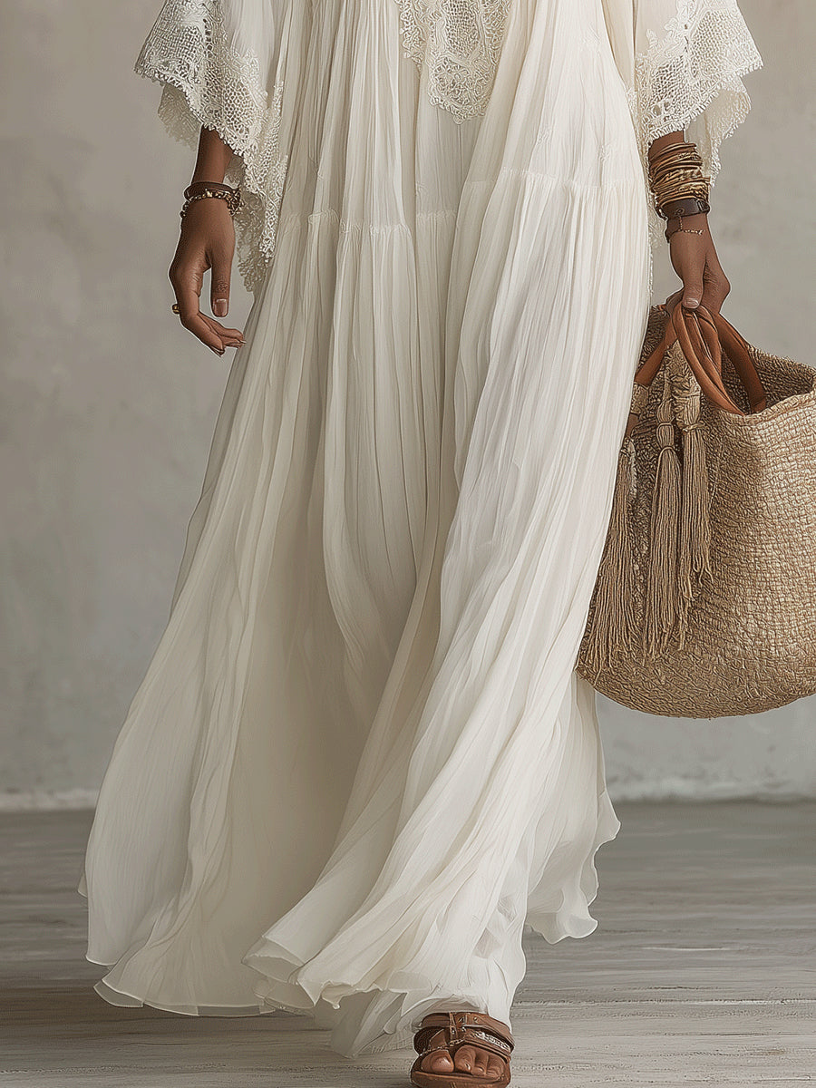Celeste | Lange jurk van ivoorkleurig chiffon met vleermuismouwen en witte kantdetails