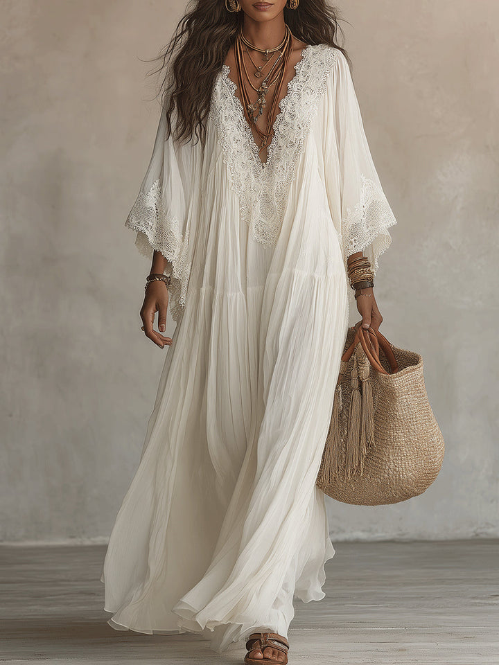 Celeste | Lange jurk van ivoorkleurig chiffon met vleermuismouwen en witte kantdetails
