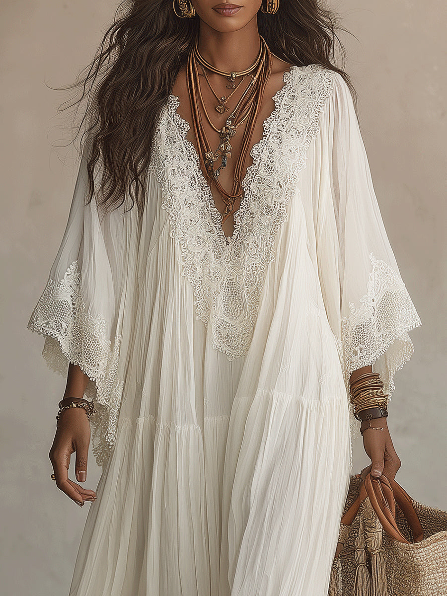Celeste | Lange jurk van ivoorkleurig chiffon met vleermuismouwen en witte kantdetails