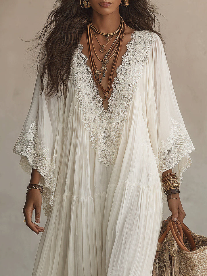 Celeste | Lange jurk van ivoorkleurig chiffon met vleermuismouwen en witte kantdetails