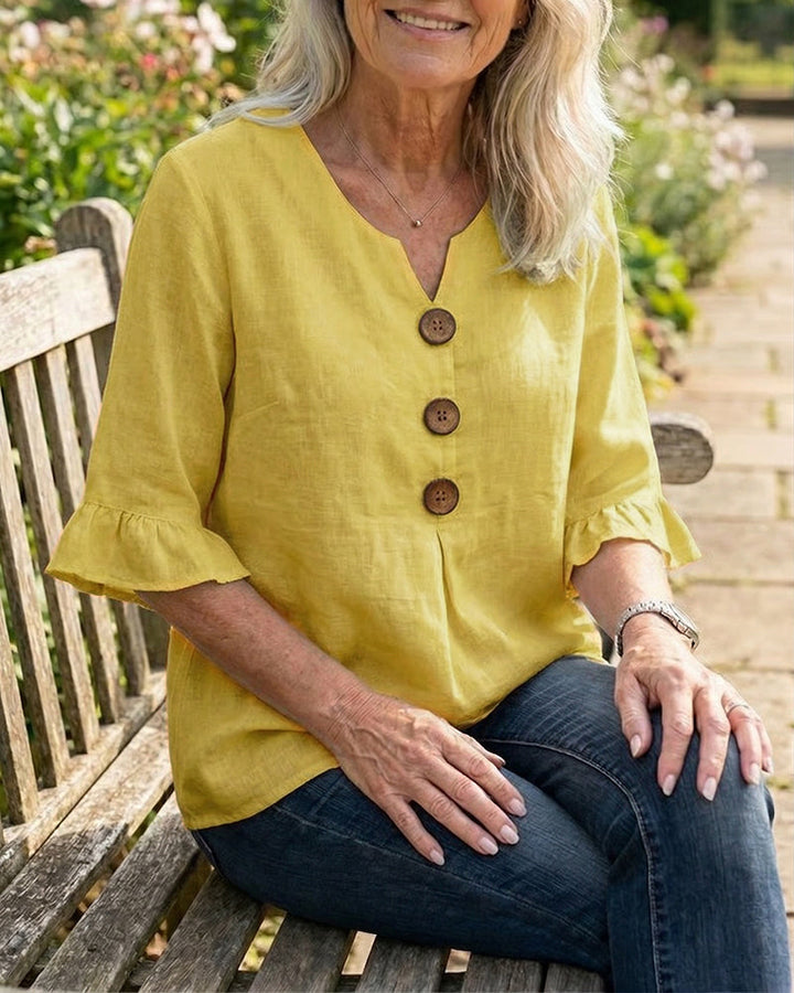 Sophia Blouse unicolor katoen-linnen met houten knopen en volant