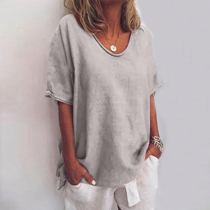 QUINA EN VEELZIJDIGE LINNEN BLOUSE